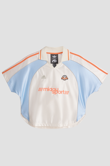 white adidas jersey with miaou sport written on chest and blue and orange accents