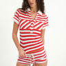 short sleeve polo button-up shirt with white collar and red, white, and black stripes 