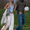 white adidas trackpant with orange stripes